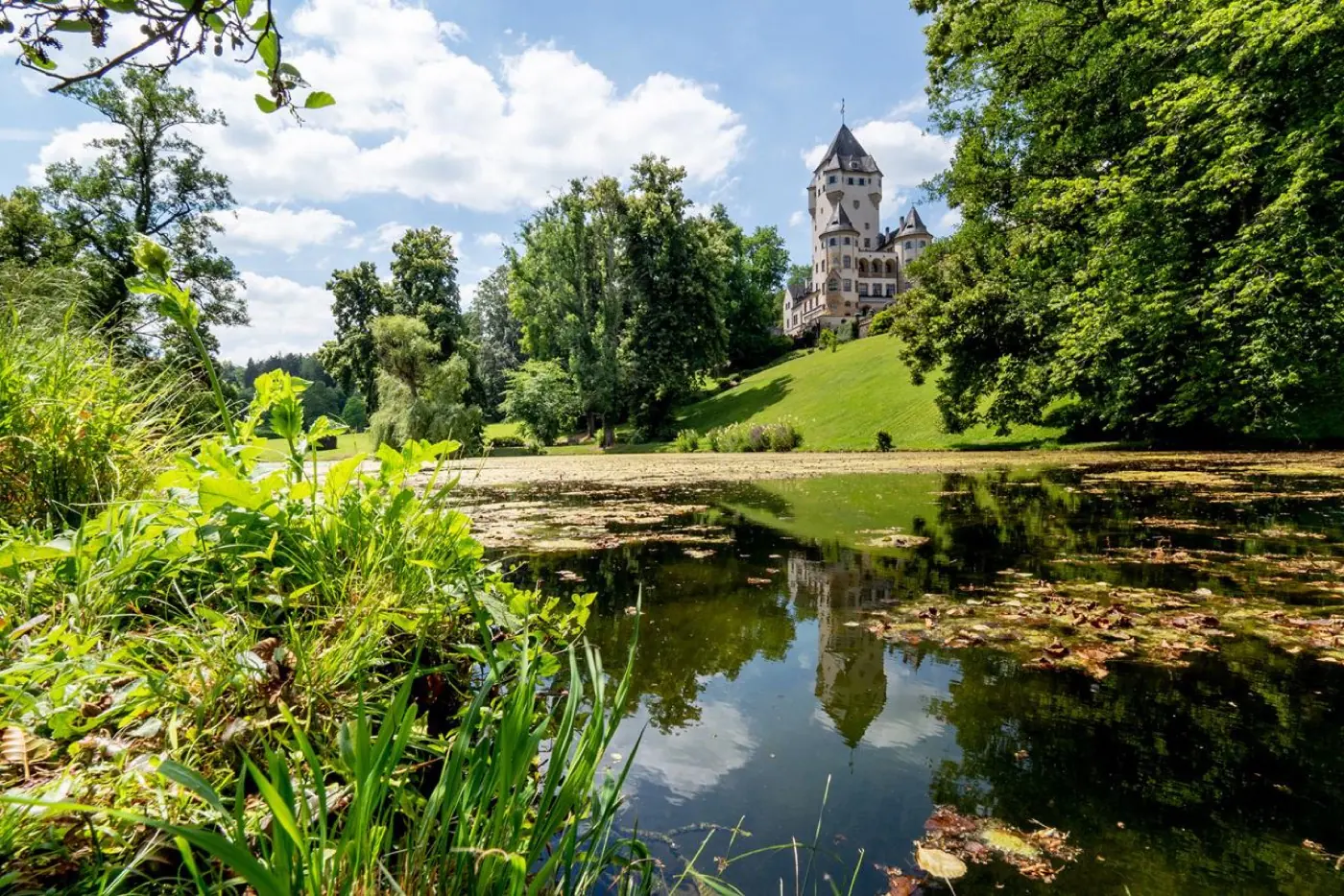 Approach to Berg Castle showing its setting in Colmar-Berg, Luxembourg