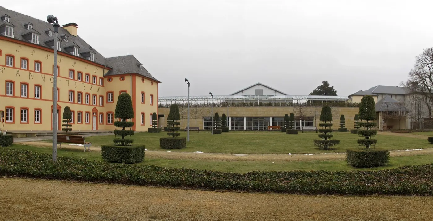 Approach to Bettange-sur-Mess Castle showing its setting in Luxembourg City, Luxembourg