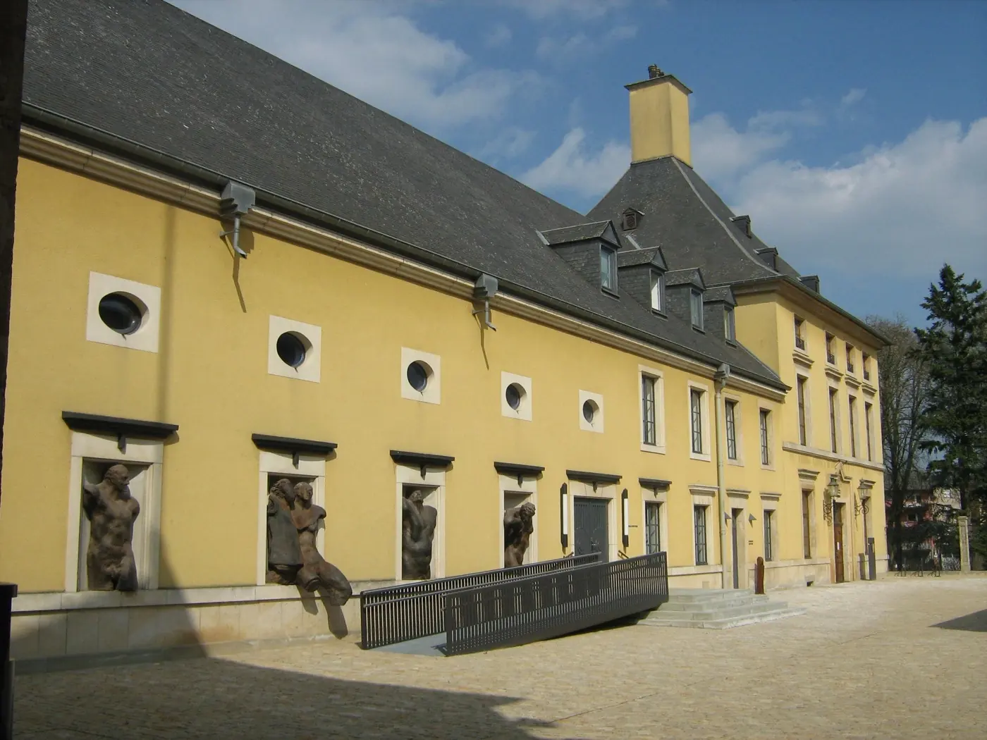 Stonework and visitor view of Bettembourg Castle, a palace in Bettembourg, Luxembourg