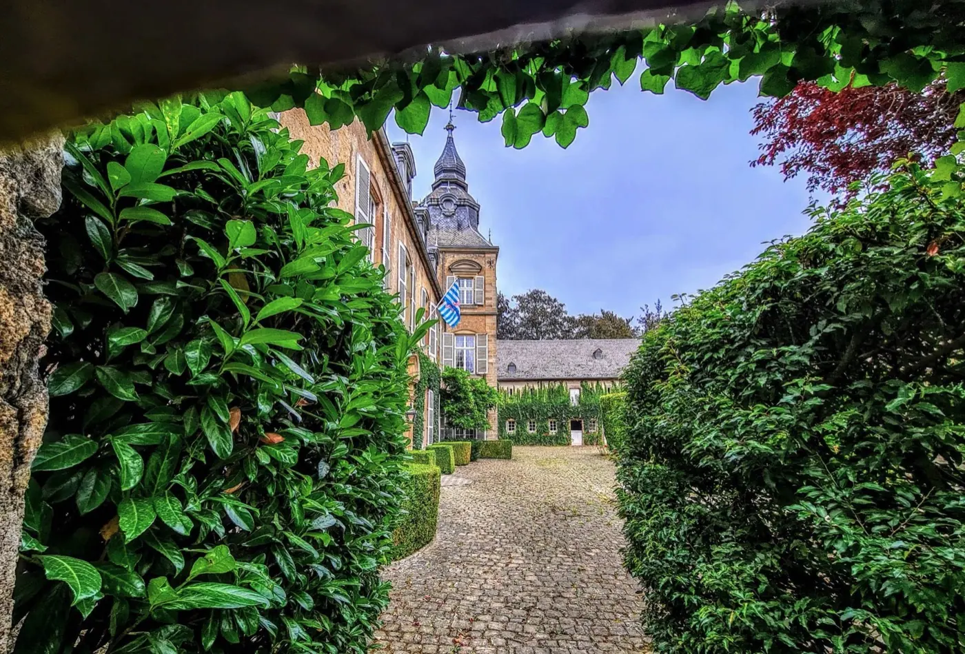 Stonework and visitor view of Bettendorf Castle, a castle in Bettendorf, Luxembourg