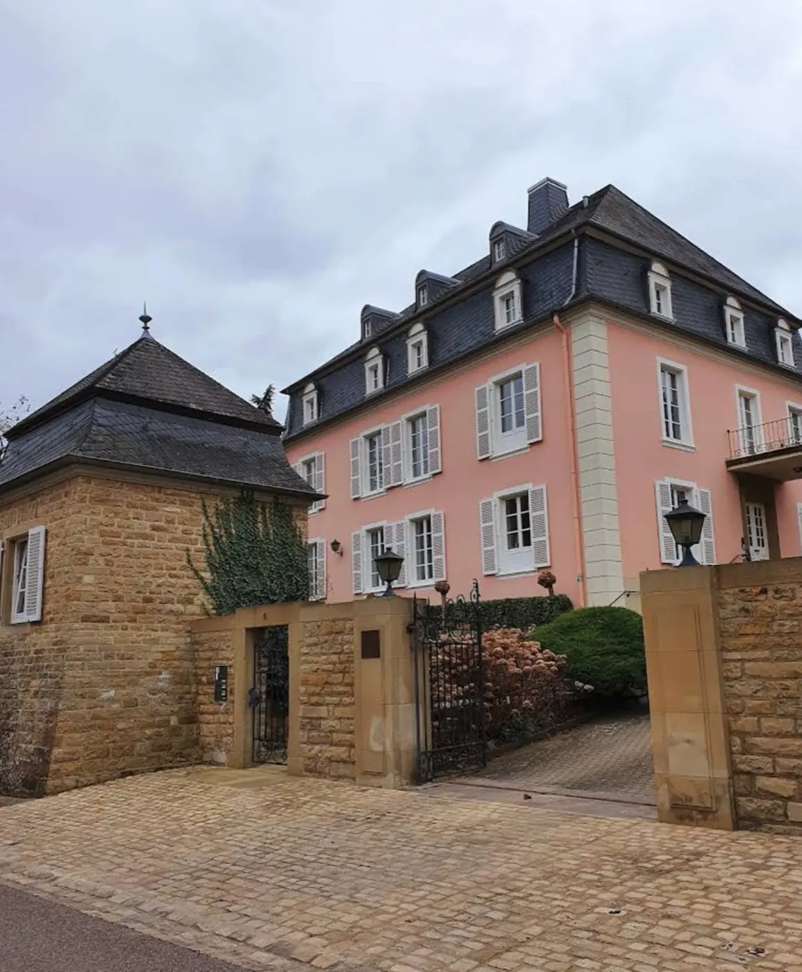 Stonework and visitor view of Born Castle, a palace in Luxembourg, Luxembourg