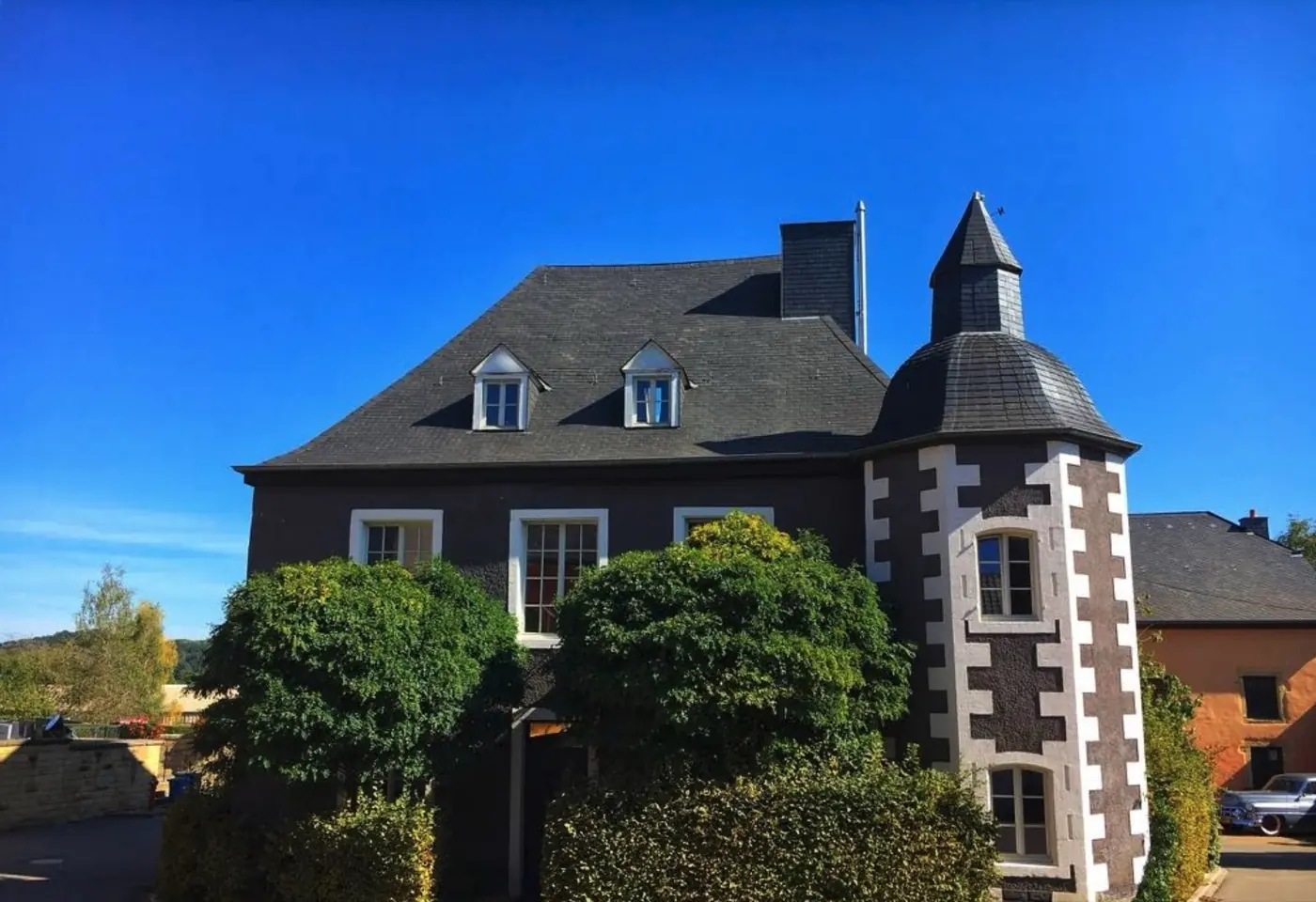 Exterior view of Clemency Castle, a palace in Clémency, Luxembourg