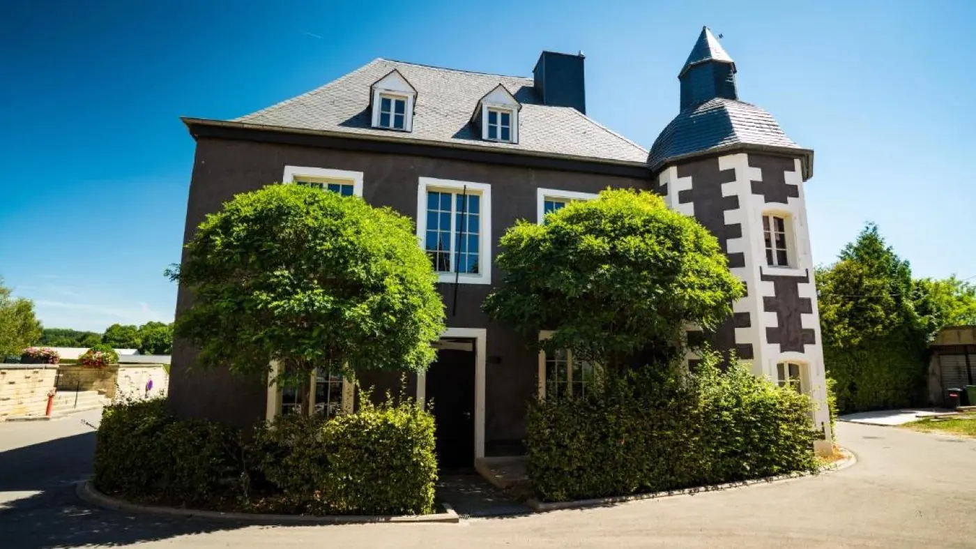 Main exterior view of Clemency Castle, a palace in Clémency, Luxembourg
