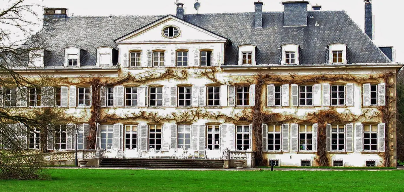 Historic facade and architectural details of Colpach Castle in Colpach, Luxembourg