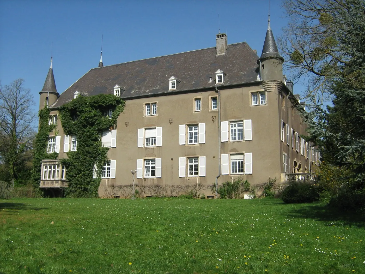 Approach to Differdange Castle showing its setting in Differdange, Luxembourg
