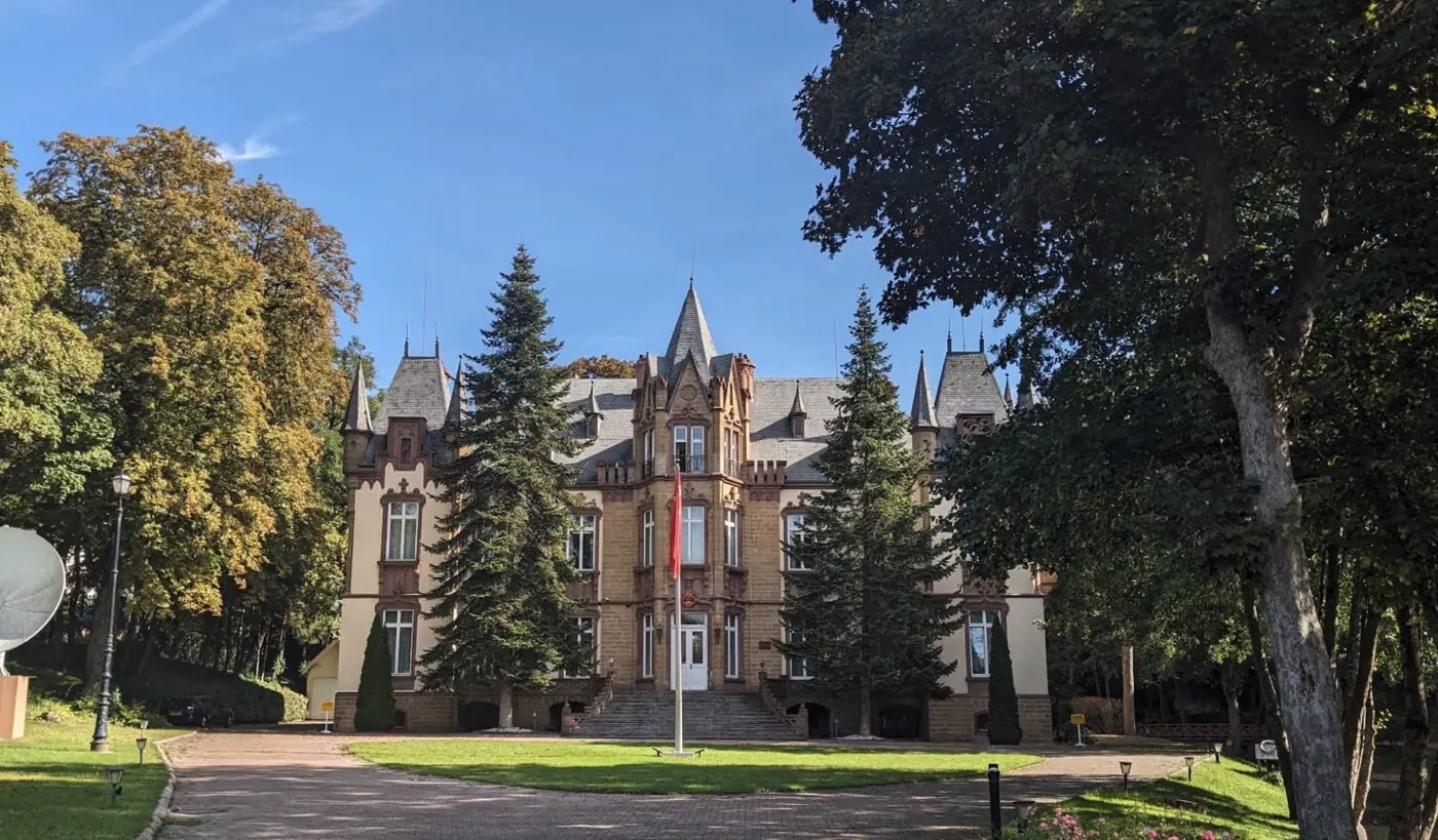 Approach to Dommeldange Castle showing its setting in Dommeldange, Luxembourg