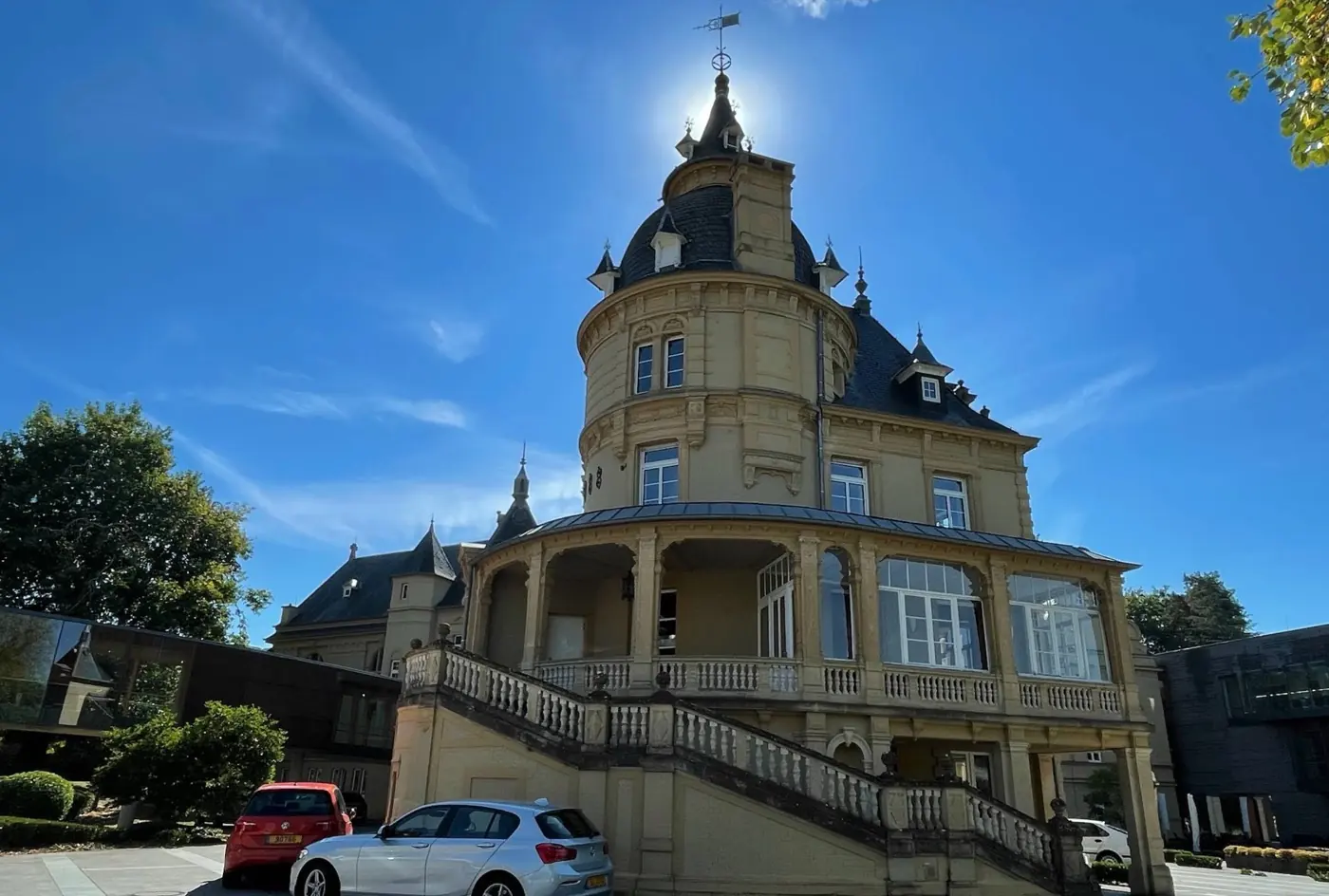 Historic facade and architectural details of Heisdorf Castle in Heisdorf, Luxembourg