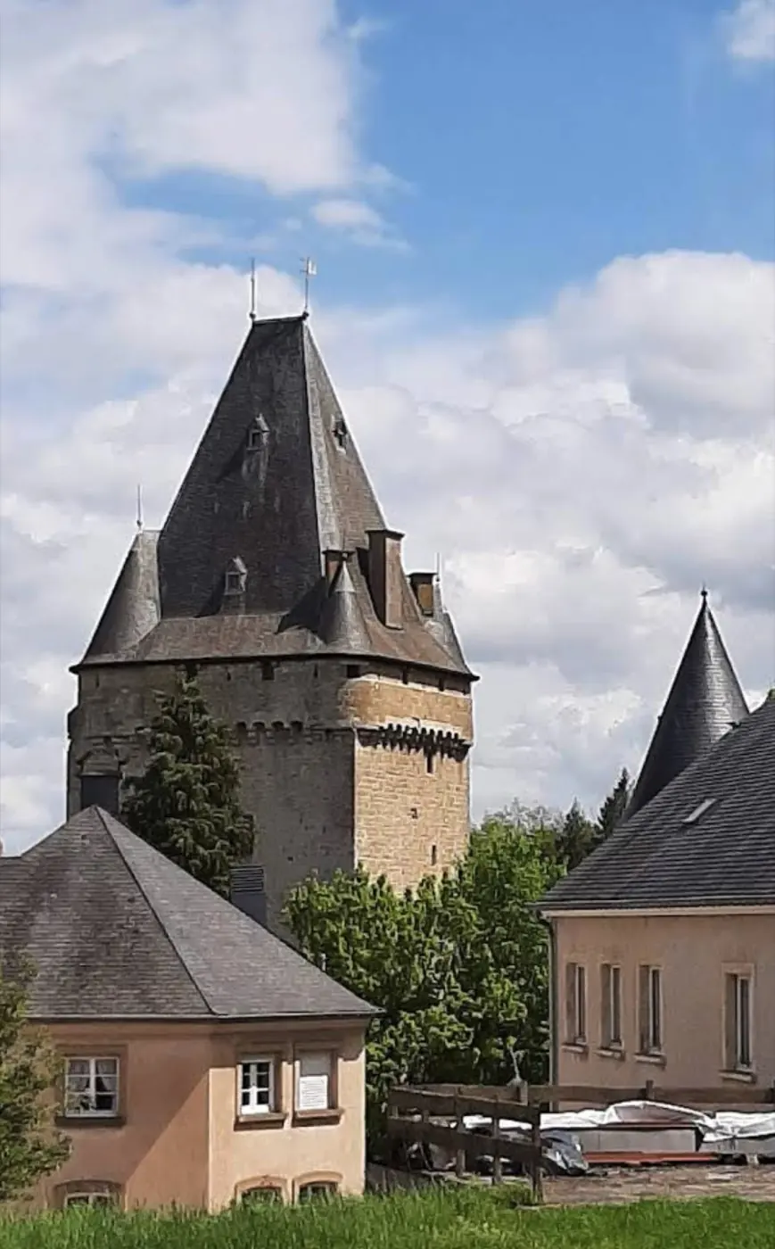 Historic facade and architectural details of Hollenfels Castle in Hollenfels, Luxembourg