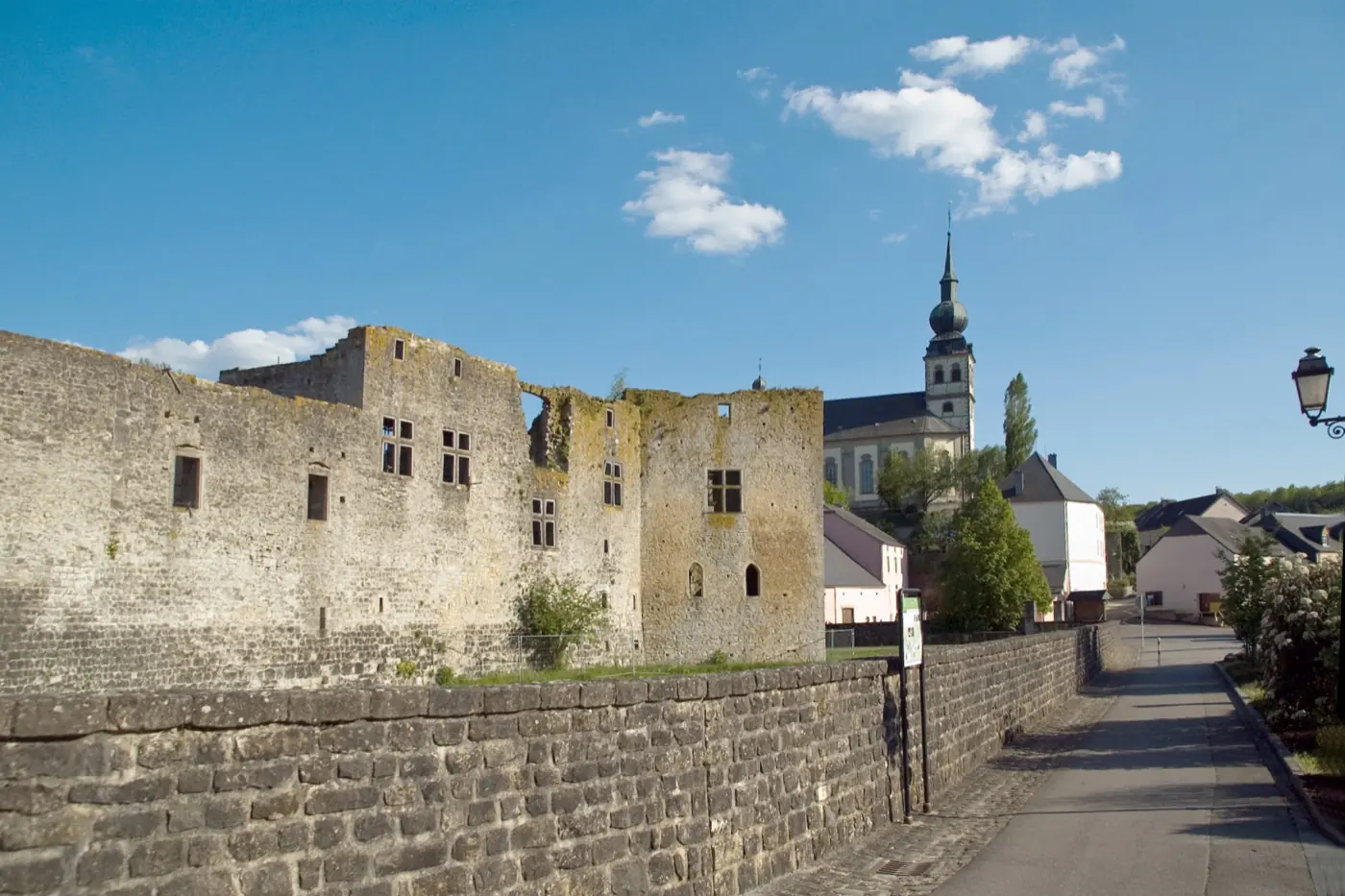 Historic facade and architectural details of Koerich Castle in Koerich, Luxembourg