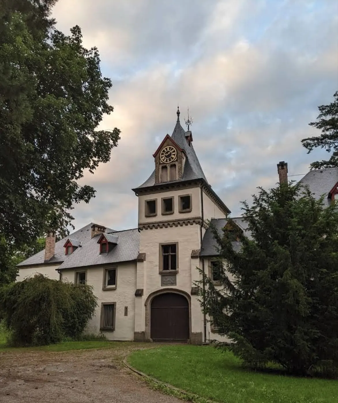 Historic facade and architectural details of Meysembourg Castle in Larochette, Luxembourg
