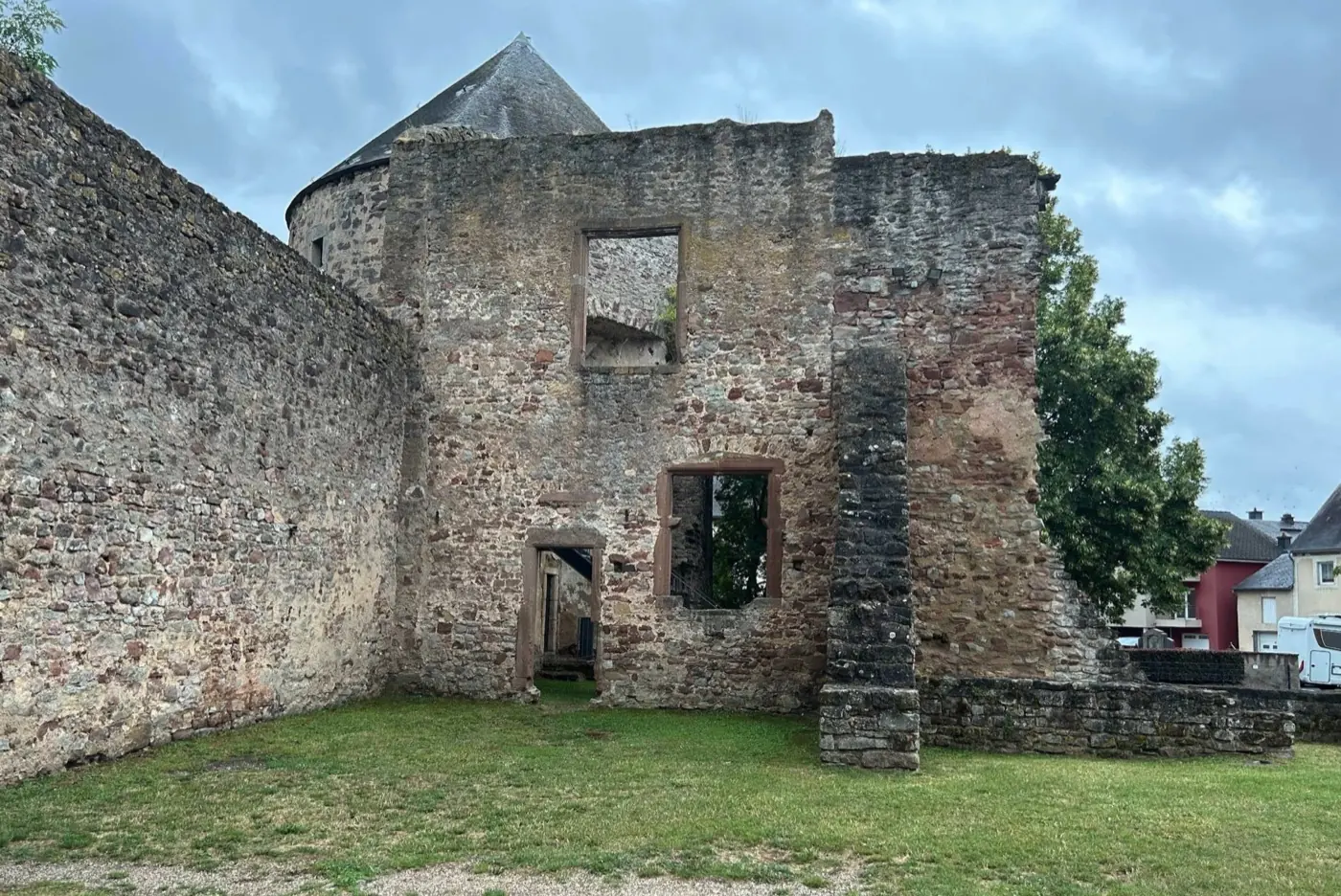 Historic facade and architectural details of Pettingen Castle in Pettingen, Luxembourg