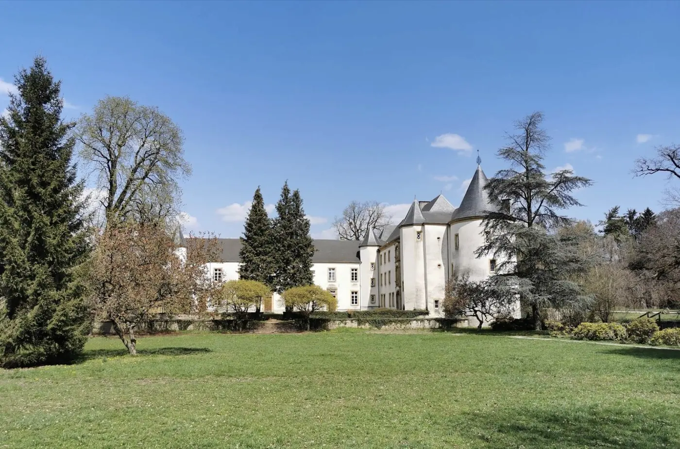 Historic facade and architectural details of Sanem Castle in Sanem, Luxembourg