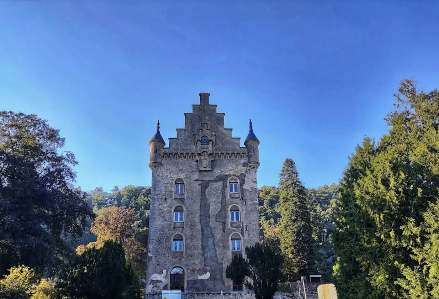 Historic facade and architectural details of Schoenfels castle in Mersch, Luxembourg