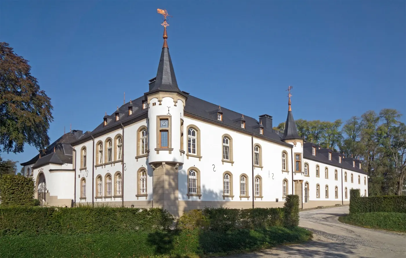 Exterior view of Urspelt Castle, a castle in Urspelt, Luxembourg