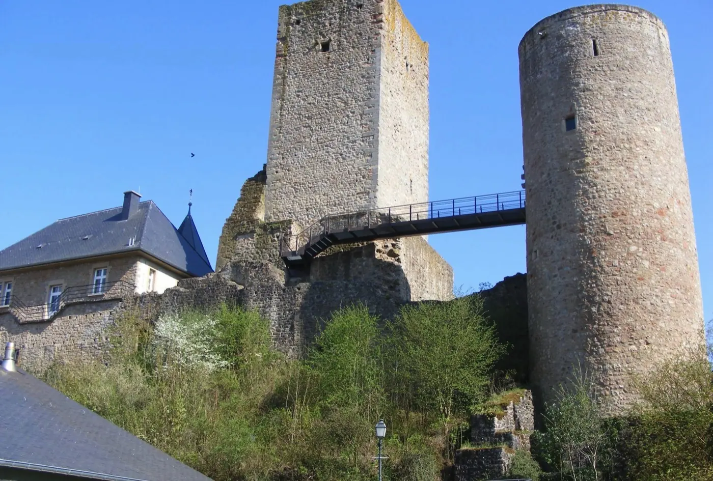 Historic facade and architectural details of Useldange Castle in Useldange, Luxembourg