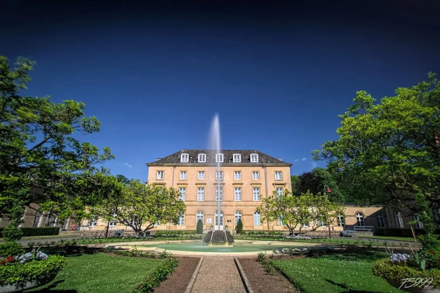 Historic facade and architectural details of Walferdange Castle in Walferdange, Luxembourg