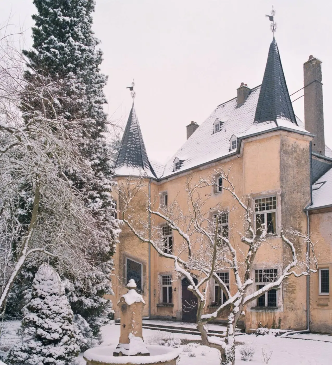 Approach to Wintrange Castle showing its setting in Wintringen, Luxembourg