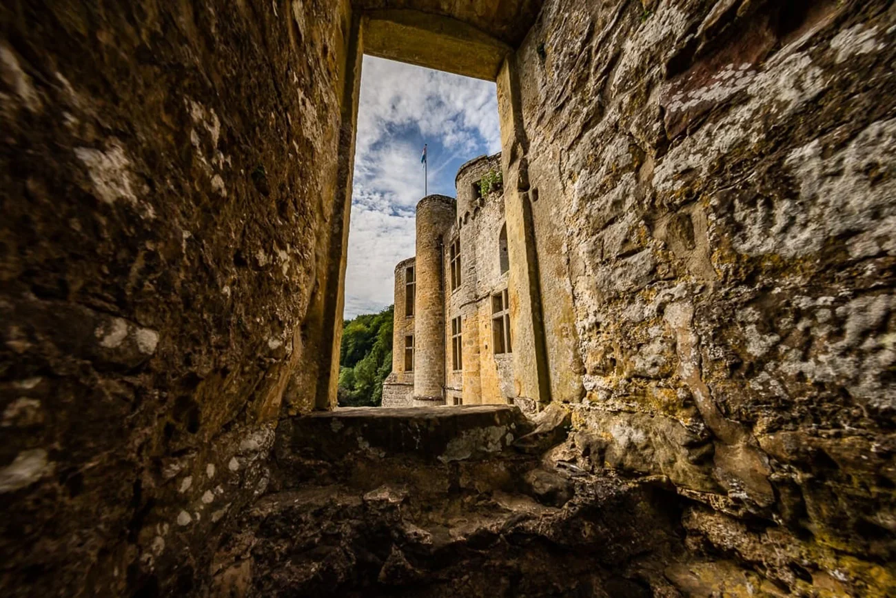 Beaufort Castle seen through a stone window